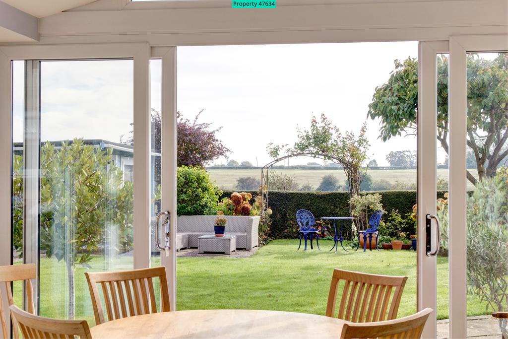 Kitchen breakfast room leading to garden