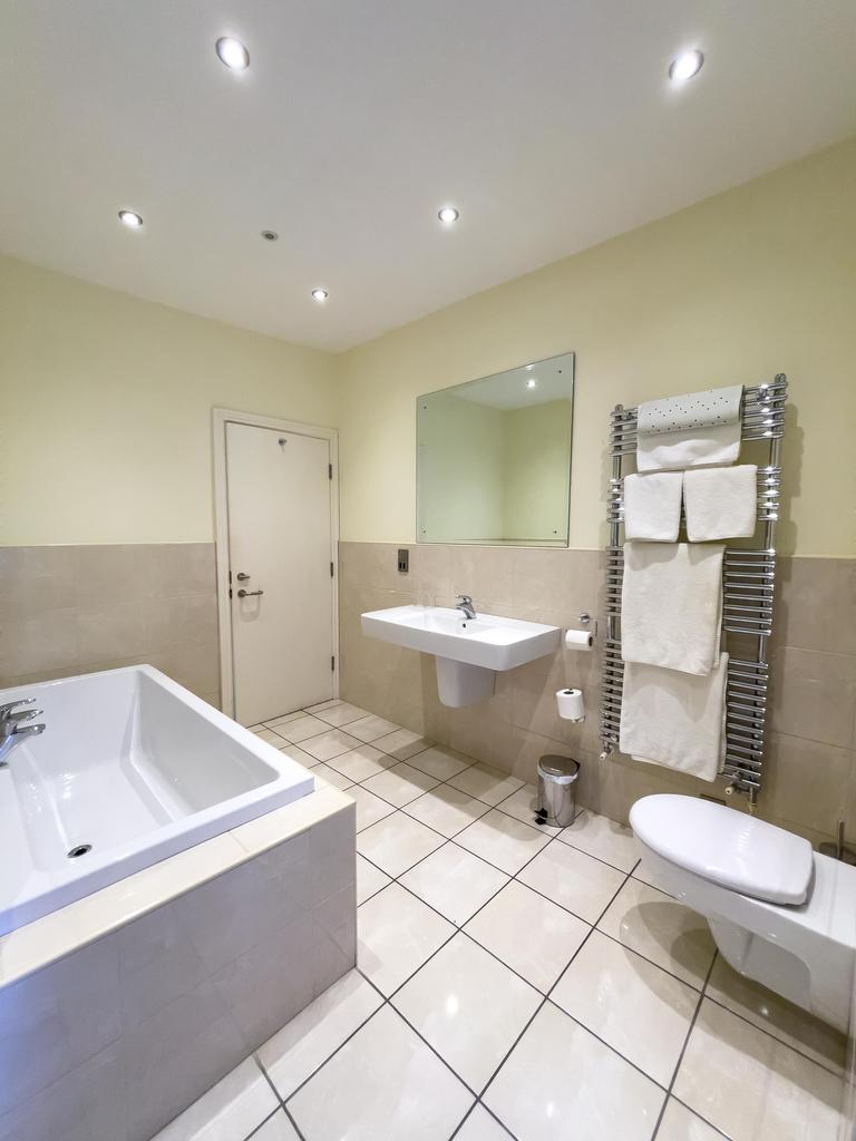 En-suite Bedroom with bathroom 1