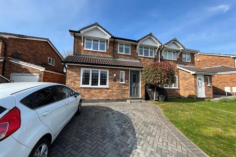 62 Turnberry Drive, Wilmslow, SK9 2QN