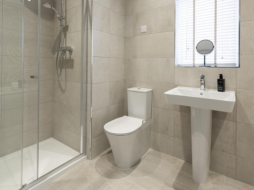 Main family bathroom with shower and separate bath