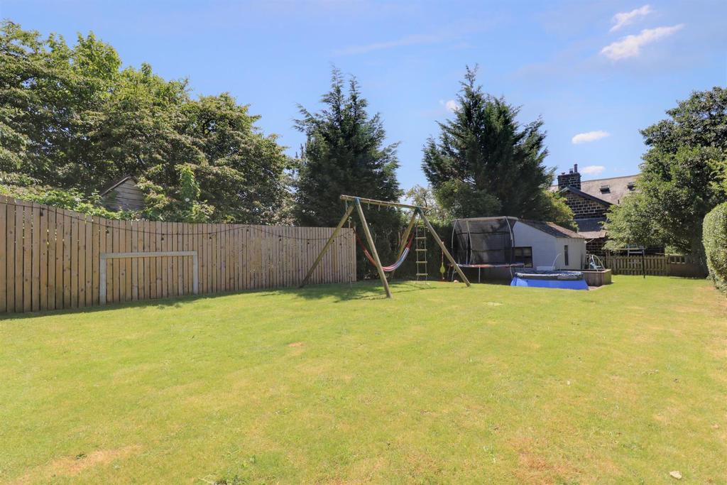 Gardens to front and rear