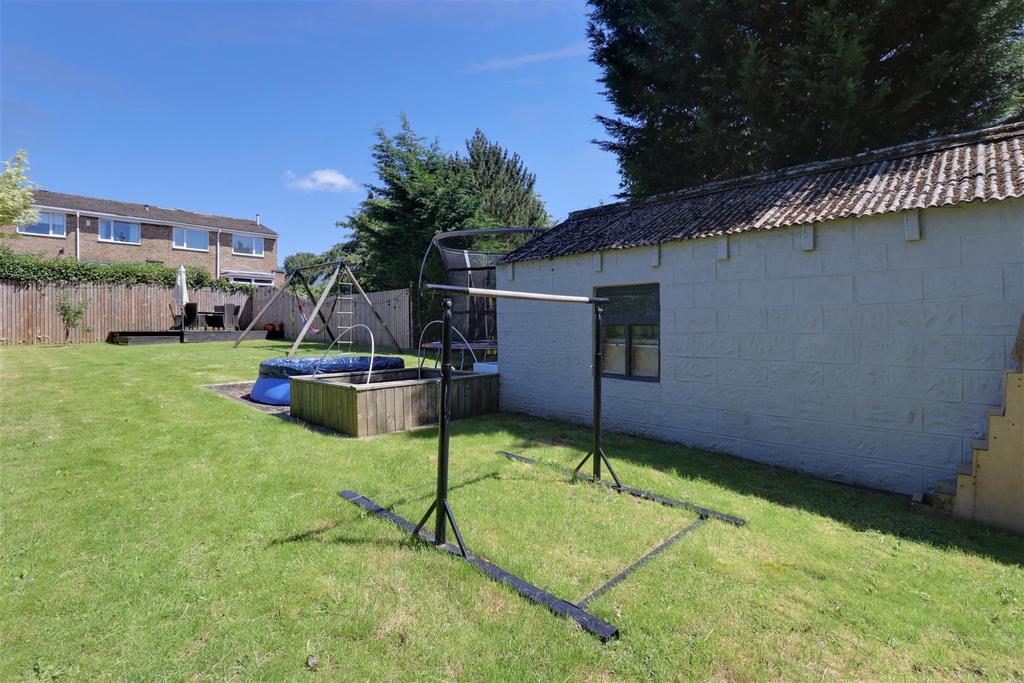 Gardens to front and rear