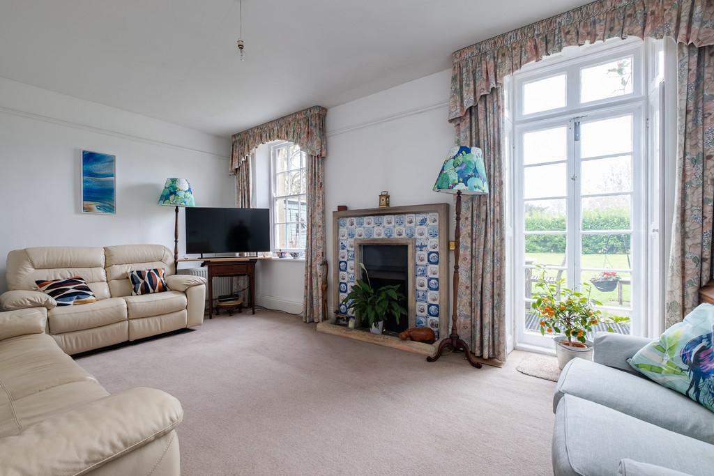 Annexe sitting room with garden views