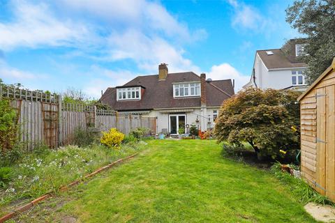 4 Ormond Drive, Hampton, TW12 2TN
