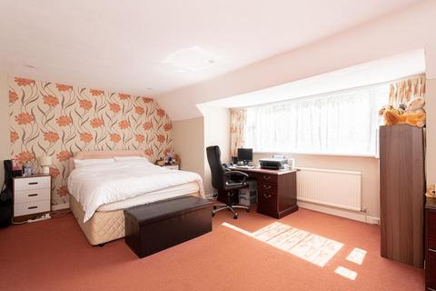11 The Ridings, Epsom, KT18 5JQ