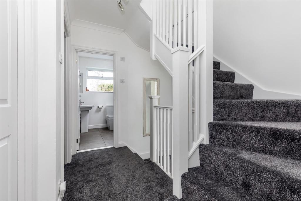 Stairs rising to Second Floor