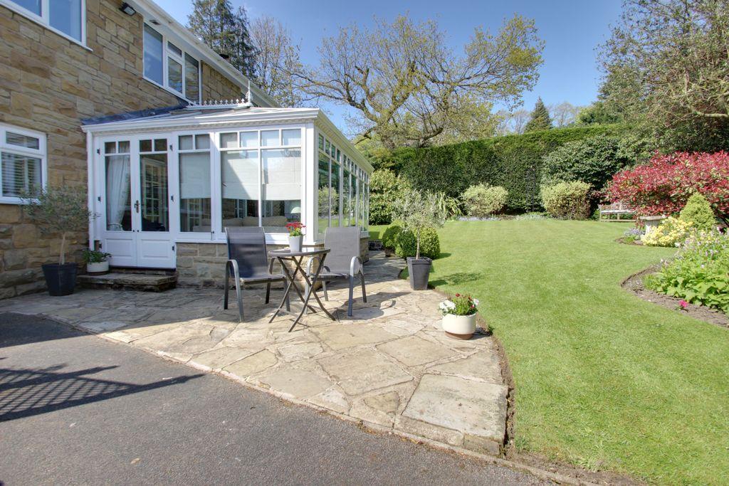 First patio and conservatory.