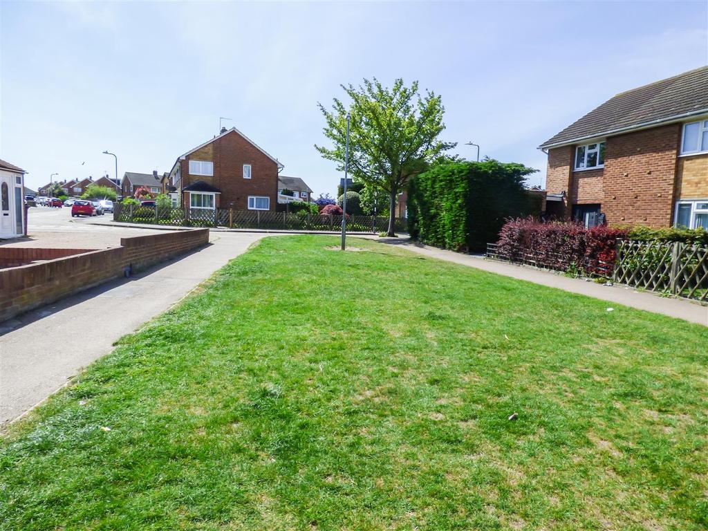Open green to  front of property