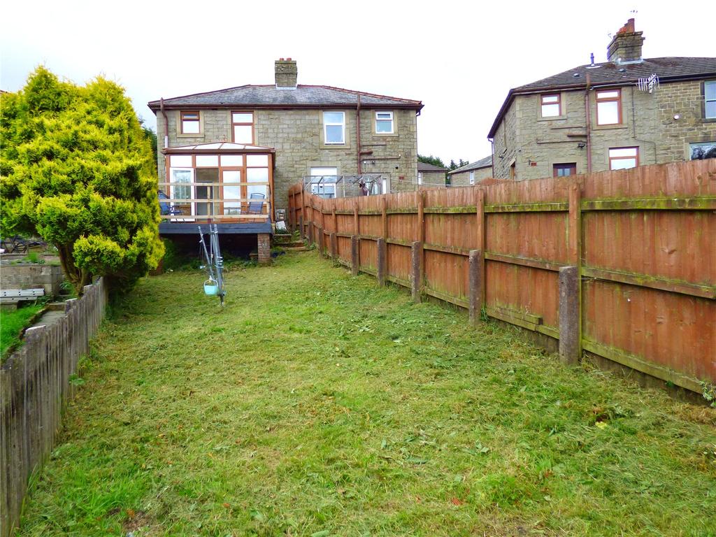 Rear Lawn/Elevation: