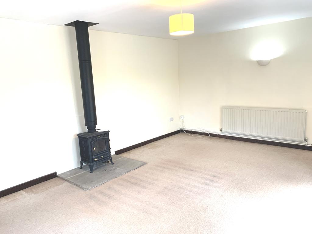 Coxs Granary Lounge wood burner