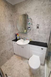 74 Hillside, Banstead, SM7 1HF