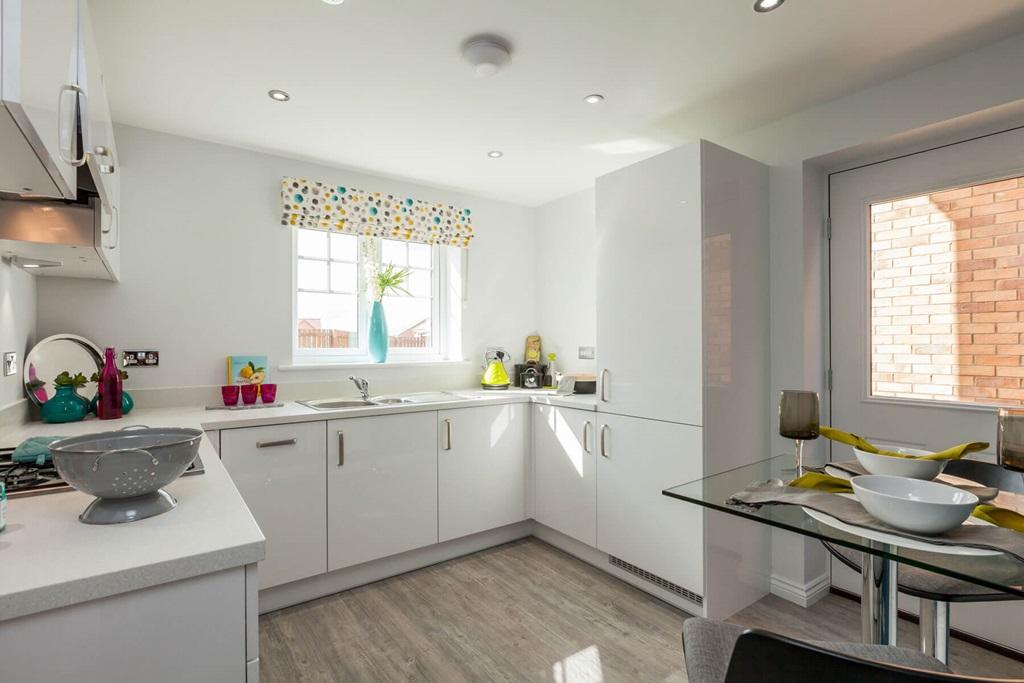 A light and spacious kitchen with breakfast area