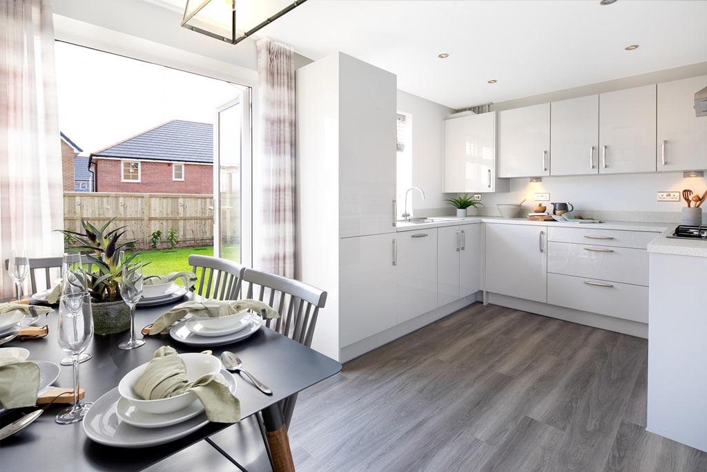 Open plan kitchen with French doors to the garden in the Moresby 3 bedroom home