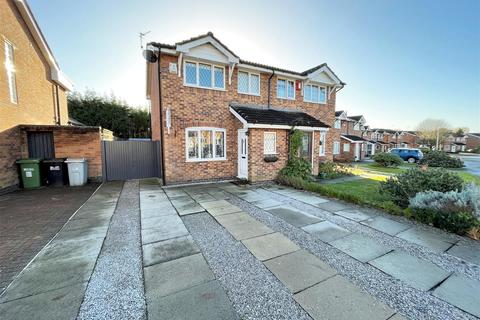 57 Turnberry Drive, Wilmslow, SK9 2QW