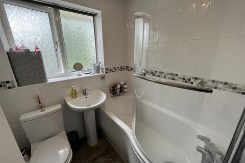 57 Turnberry Drive, Wilmslow, SK9 2QW