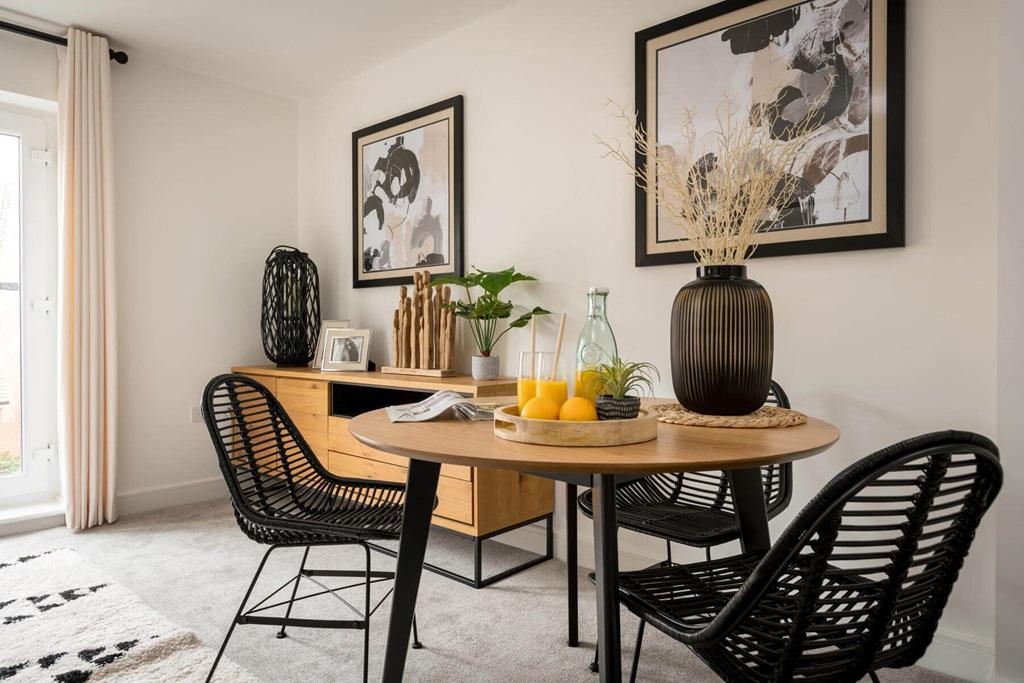 Include a small dining table in the open plan kitchen lounge area