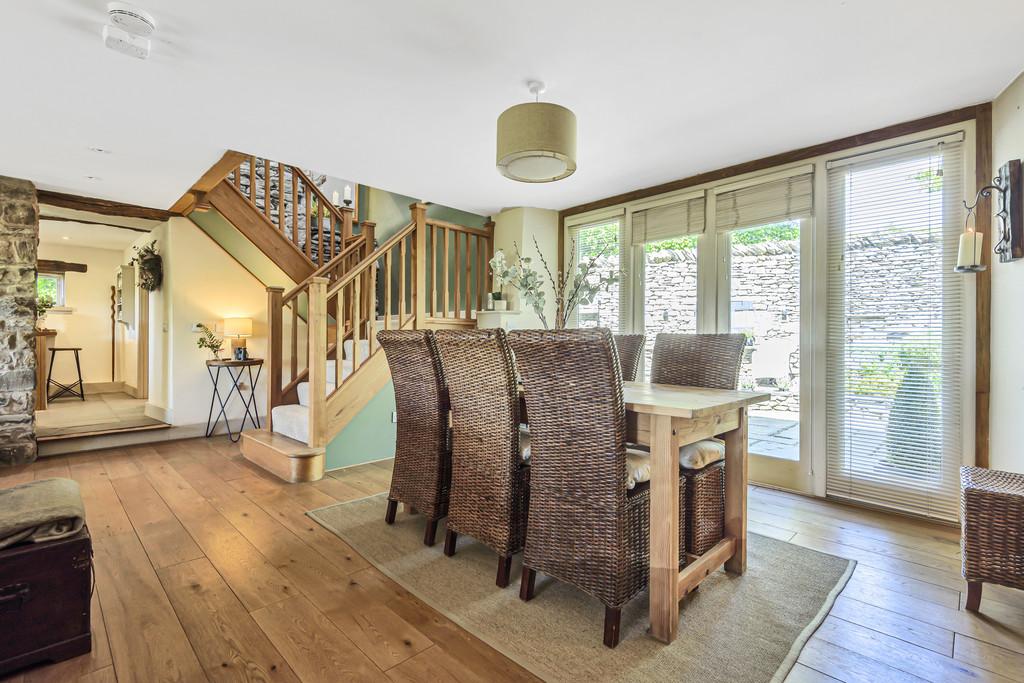 Dining area with patio doors to paved courtyard