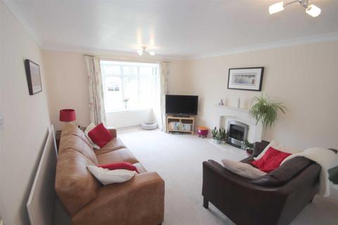 21 Turnberry Drive, Wilmslow, SK9 2QW