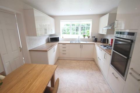 21 Turnberry Drive, Wilmslow, SK9 2QW