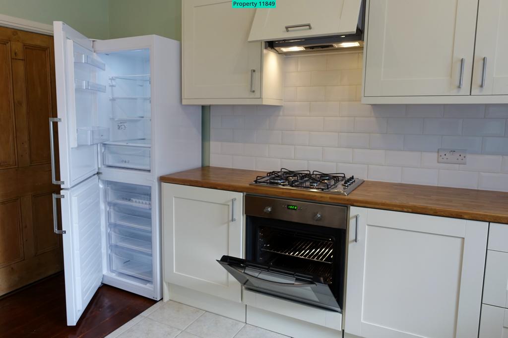 New large fridge freezer. Electric oven, gas hobs