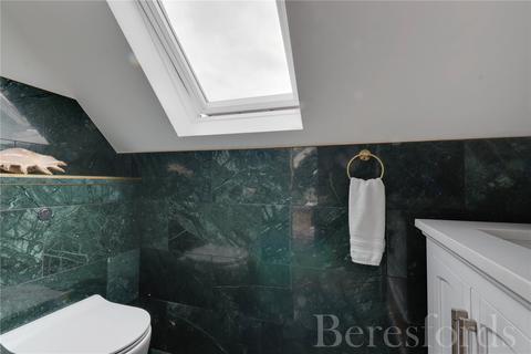 46 Woodstock Avenue, Romford, RM3 9NF