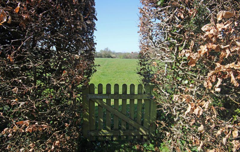 Gate to footpath...