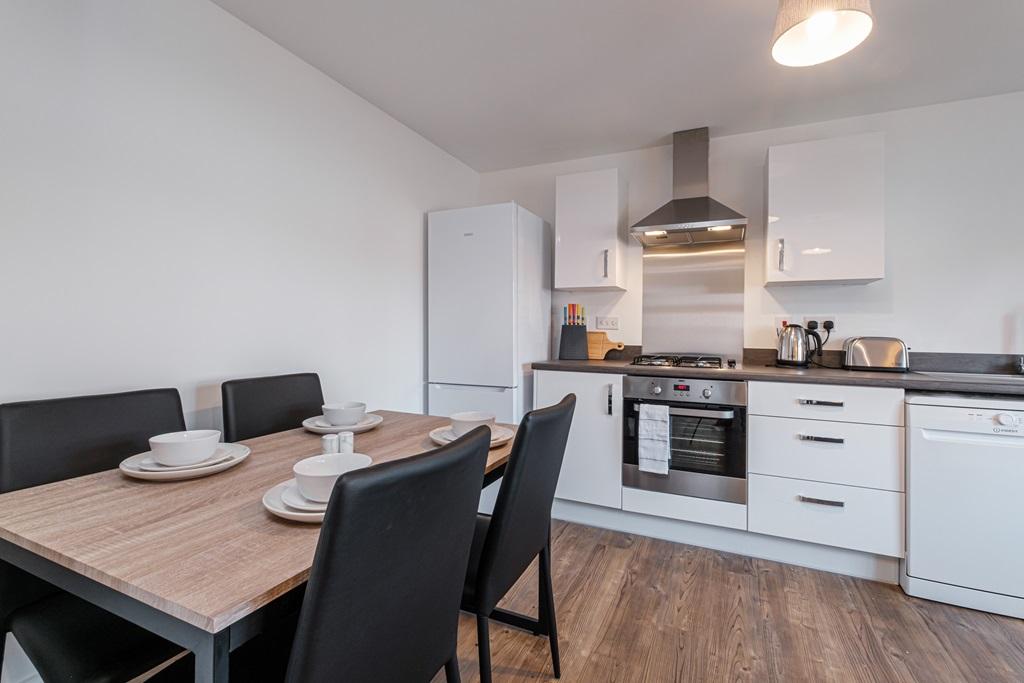 Dining area in a DWH Harbury apartment
