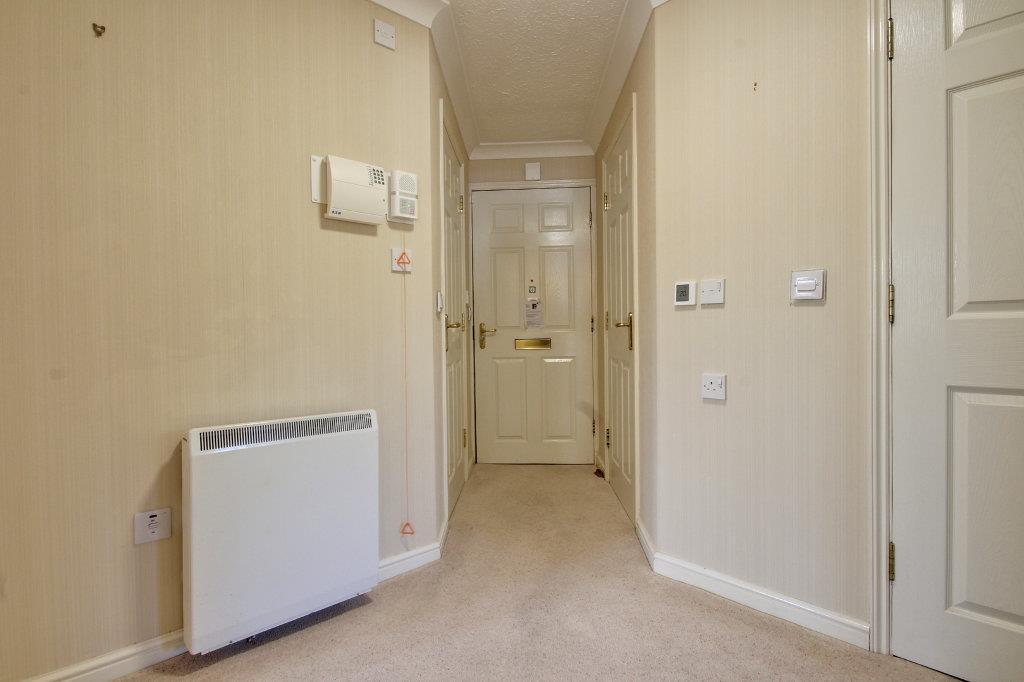Entrance Hallway with two storage cupboards