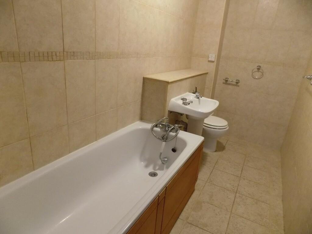 7754