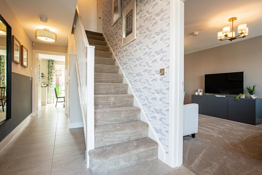 The entrance hall leads you to the lounge and kitchen, with an under stairs WC