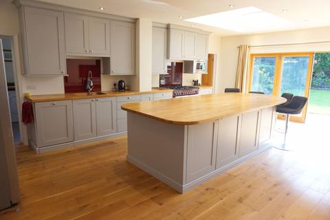 9 Fiddicroft Avenue, Banstead, SM7 3AD