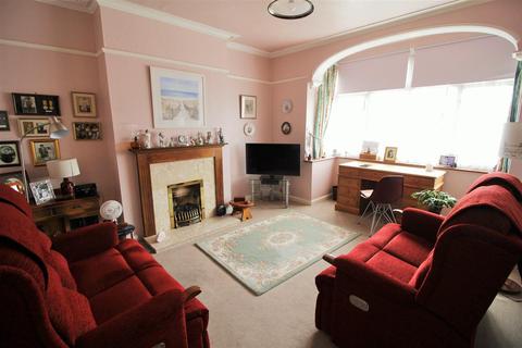 28 Charminster Avenue, London, SW19 3EL
