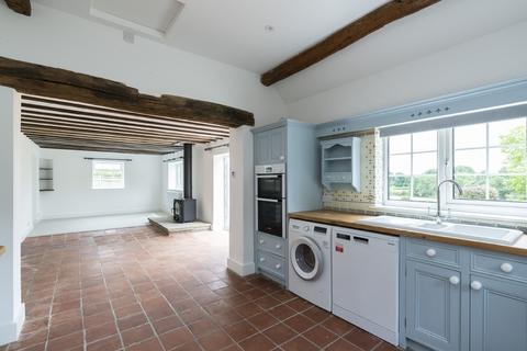 4 bedroom detached house to rent, Betchetts Green Road, Holmwood, Dorking