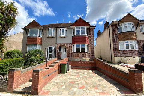 14 Churston Drive, Morden, SM4 4JB