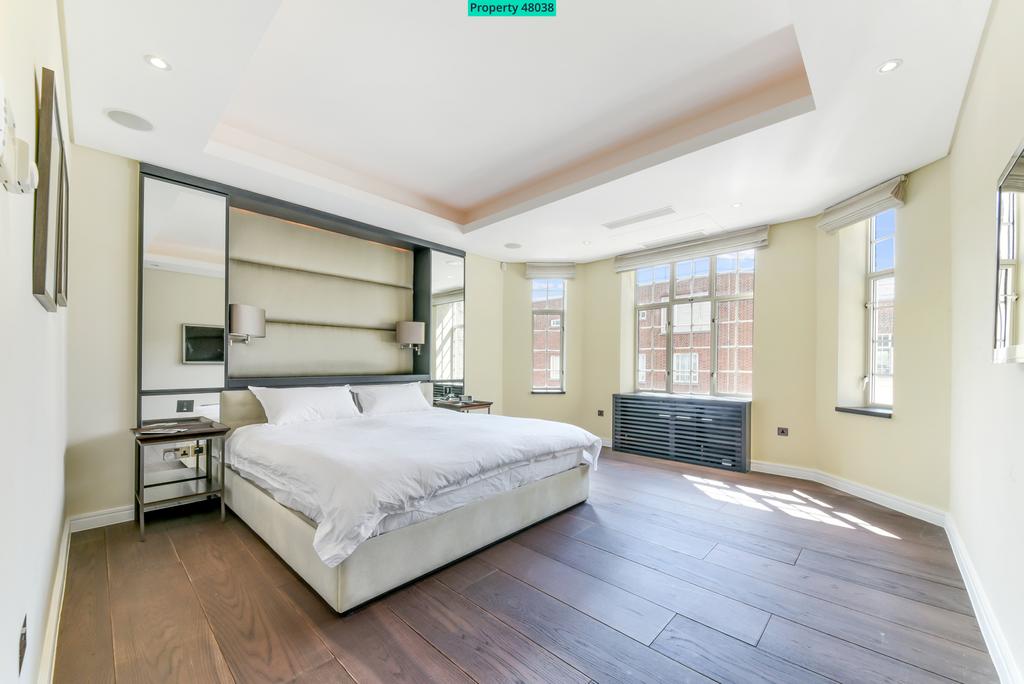 Master Bed + Walk In Wardrobe