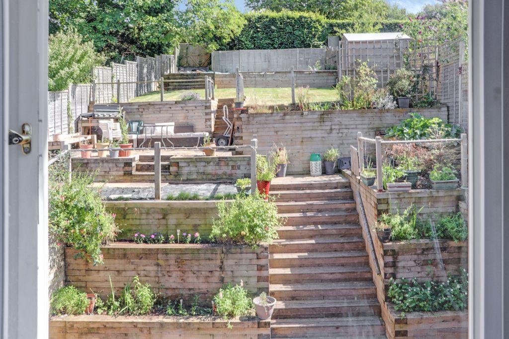 Window view of tiered garden