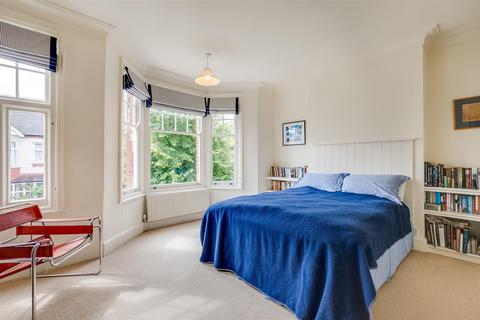 77 Stuart Road, London, SW19 8DJ