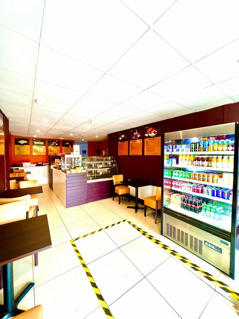 Cafe shop with 2bedroom flat and warehouse at rea