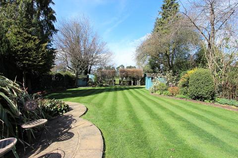 24 Garratts Lane, Banstead, SM7 2EA