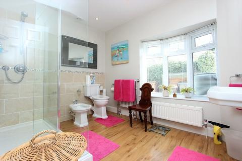 24 Garratts Lane, Banstead, SM7 2EA