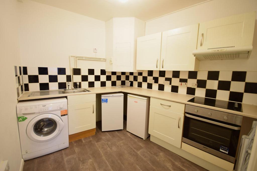 Kitchen with white good included