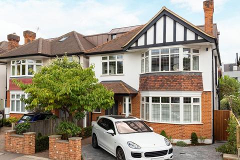 68 Woodside, London, SW19 7AF
