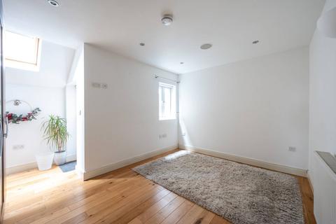 1a Gilbert Road, London, SW19 1BP