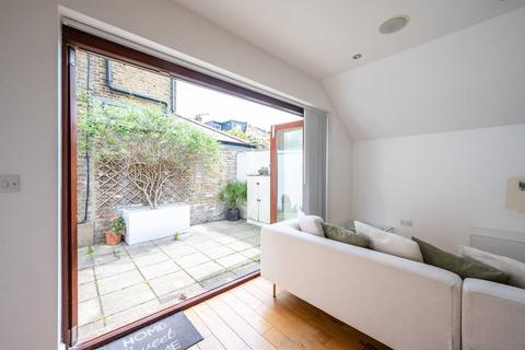 1a Gilbert Road, London, SW19 1BP
