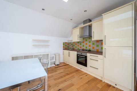 1a Gilbert Road, London, SW19 1BP