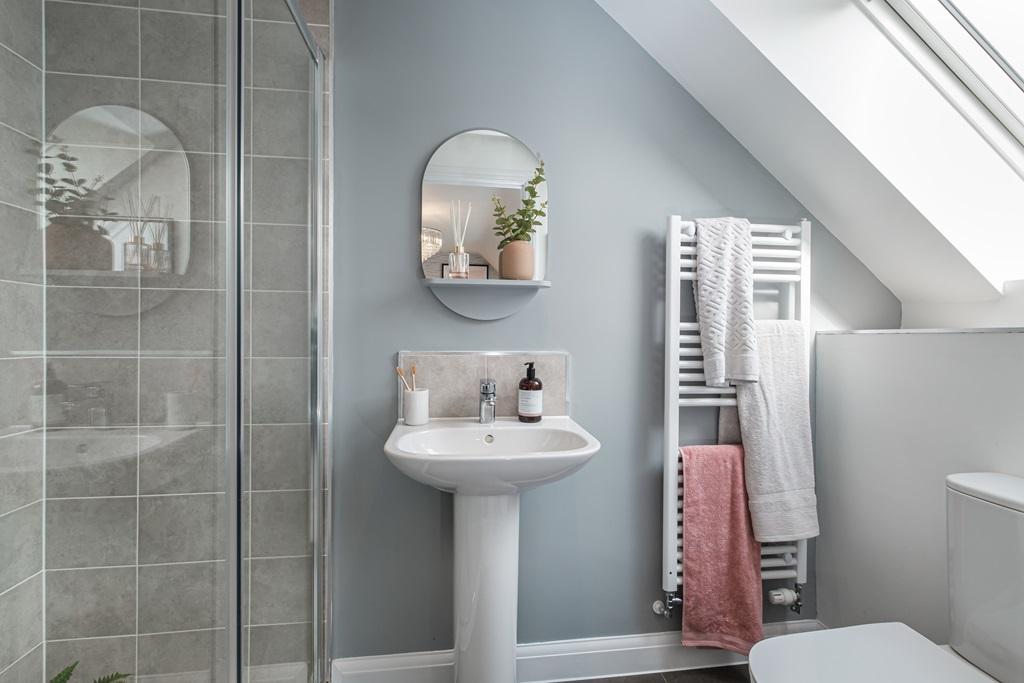 Kennett en suite shower room with slanted ceiling