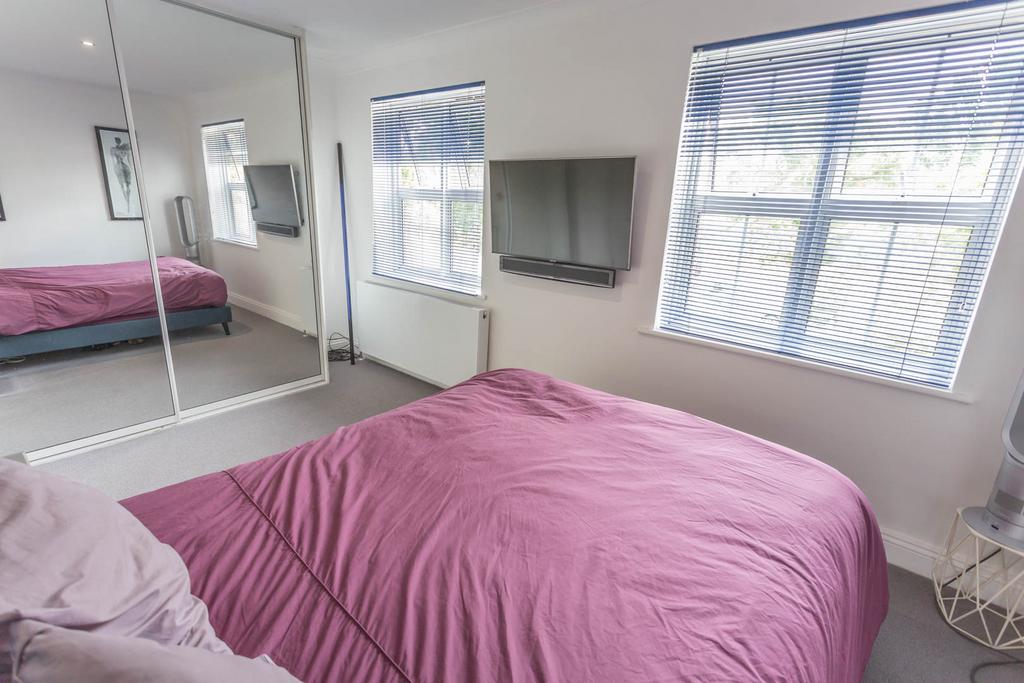 Bedroom 1 with wardrobes