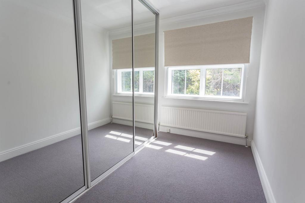 Bedroom 2 with wardrobes