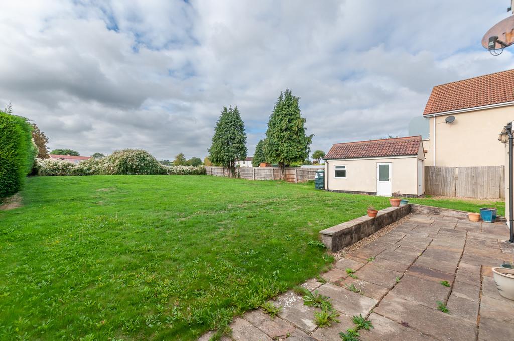 Rear garden with garage