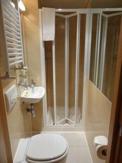 Studio to rent, Cartwright Gardens, Bloomsbury, London, WC1H